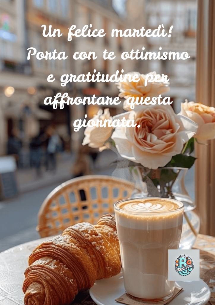 Una-tazza-di-cappuccino-con-un-disegno-sulla-schiuma,-un-croissant-dorato-su-un-tavolo-e-un-vaso-di-rose,-con-una-strada-cittadina-sullo-sfondo-e-un-messaggio-che-augura-un-felice-martedì.
