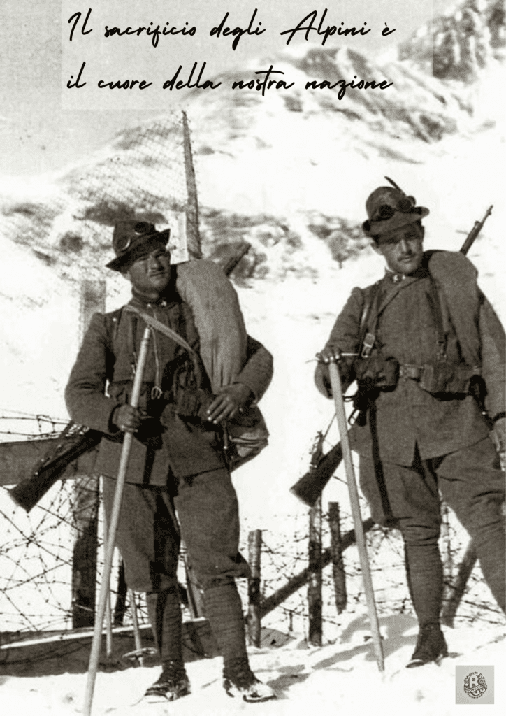 Alpini-al-fronte-durante-la-Giornata-Nazionale-del-Sacrificio-degli-Alpini-con-il-testo-Il-sacrificio-degli-Alpini-è-il-cuore-della-nostra-nazione.
